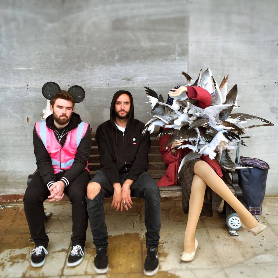 Doug Gillen (middle) at Dismaland - the woman with pigeons is an artwork